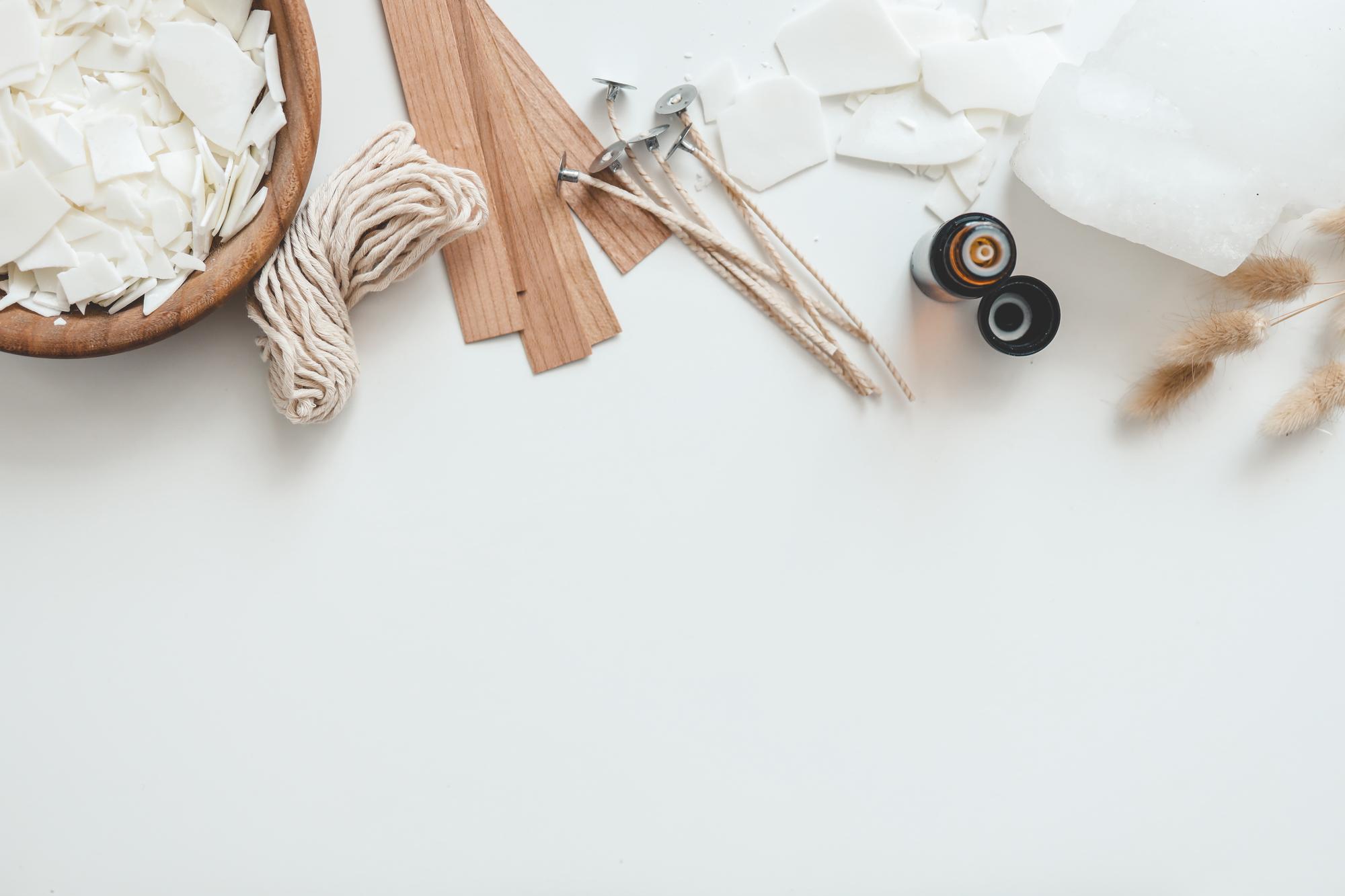 Workshop table with threads, needles and linen in natural light
